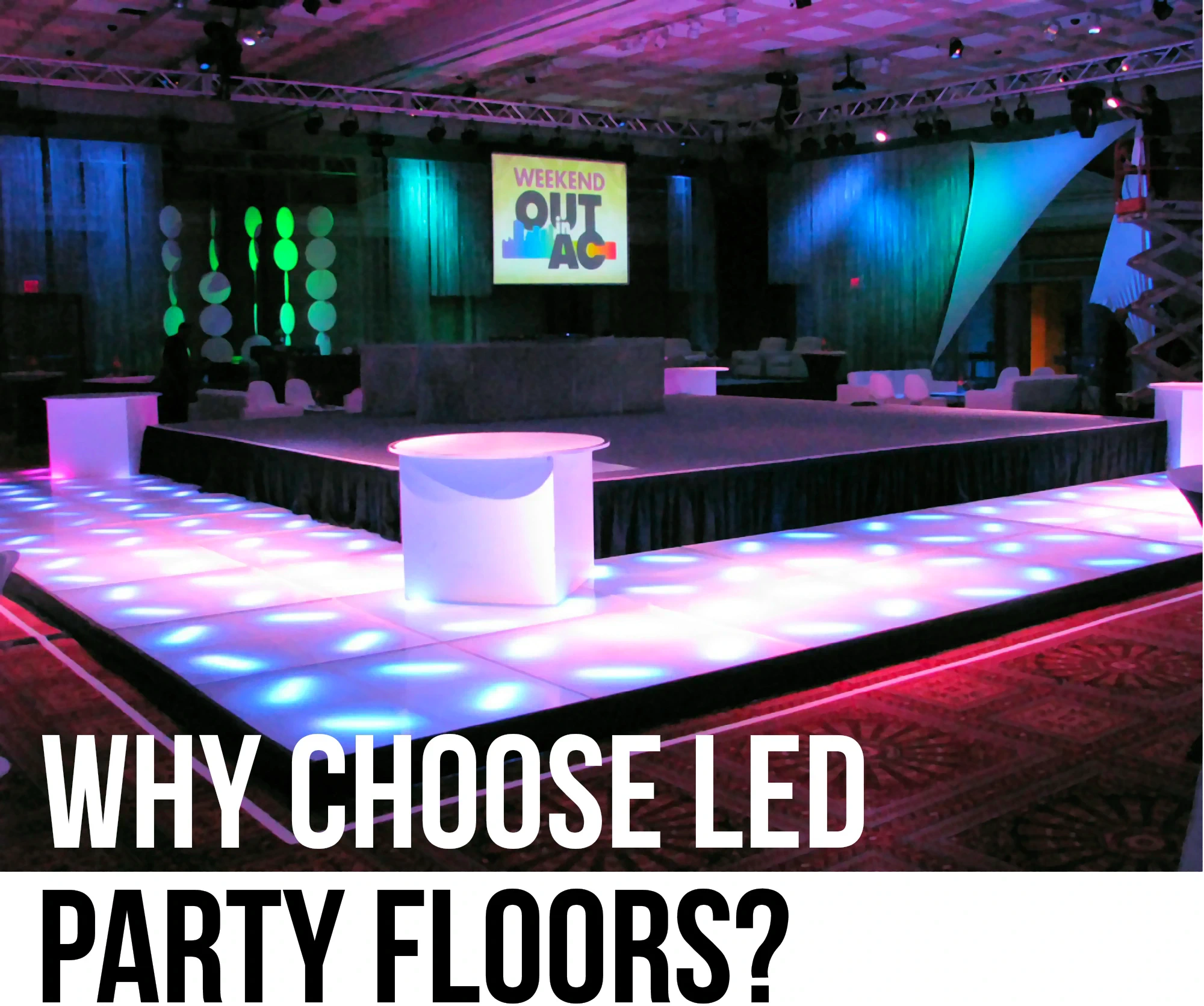 Rental dance floor surrounding a stage on three sides.